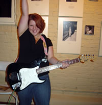Girl Rocker with Black Stratocaster